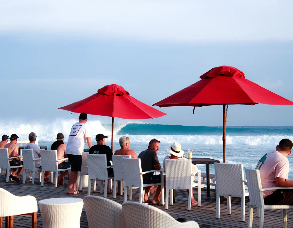Deck crew at Pasta Point handling surfboards and gear, Maldives – Atoll Travel
