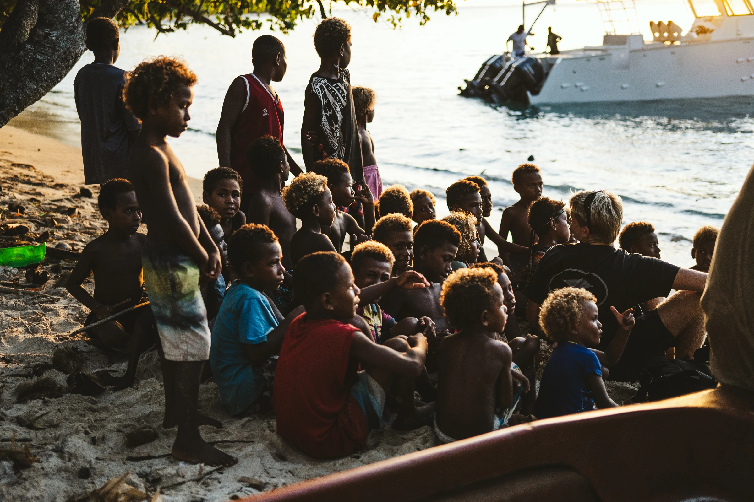 Surfer carving a wave with spray in tropical Maldives waters – Atoll Travel